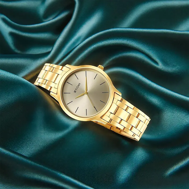 Titan Karishma Radiance Champagne Dial Men's Watch | 1825YM08